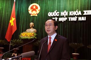 Đồng chí Trần Đại Quang, Ủy viên Bộ Chính trị, Bộ trưởng Bộ Công an trình bày báo cáo của Chính phủ về công tác phòng ngừa, chống vi phạm pháp luật và tội phạm. Ảnh: Hoàng Long.
