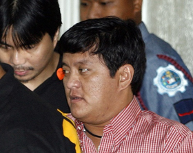 Andal Ampatuan con (phải) tại phiên tòa ngày 5-1 ở Quezon, ngoại ô Manila - Ảnh: Reuters