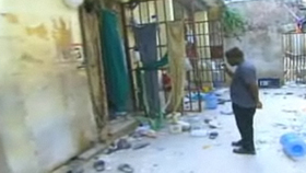 Cửa các phòng giam tại nhà tù ở thủ đô Haiti mở toang.