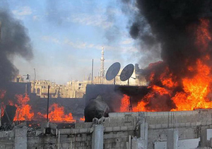 Thành phố Homs của Syria đang hứng pháo kích liên tục từ quân đội - Ảnh: AFP