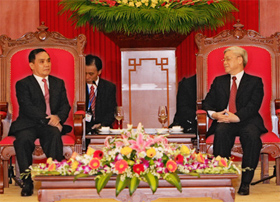 Tổng Bí thư, Chủ tịch Quốc hội Nguyễn Phú Trọng tiếp Thủ tướng Chính phủ nước Cộng hòa Dân chủ Nhân dân Lào Thoong- xỉnh Thăm-ma-vông .