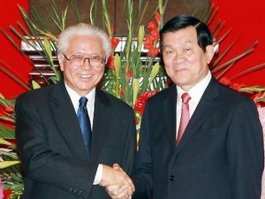 Chủ tịch nước Trương Tấn Sang đón Tổng thống Tony Tan Keng Yam. (Ảnh: Nguyễn Khang - TTXVN)