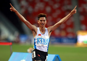 VĐV Dương Văn Thái giành HCV ở nội dung chạy 1.500 m nam. Ảnh: QUANG THẮNG