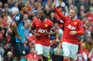 Rooney (ngoài cùng bên phải) đã gieo sầu cho Arsenal với cú hat-trick trong trận đấu này. 

