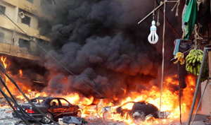 Hiện trường vụ đánh bom xe ở Li-băng ngày 15/8
(Ảnh: AFP/ Getty Images)