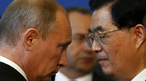 Tổng thống Nga Vladimir Putin và Chủ tịch Trung Quốc Hồ Cẩm Đào tại APEC 20 - Ảnh: Reuters